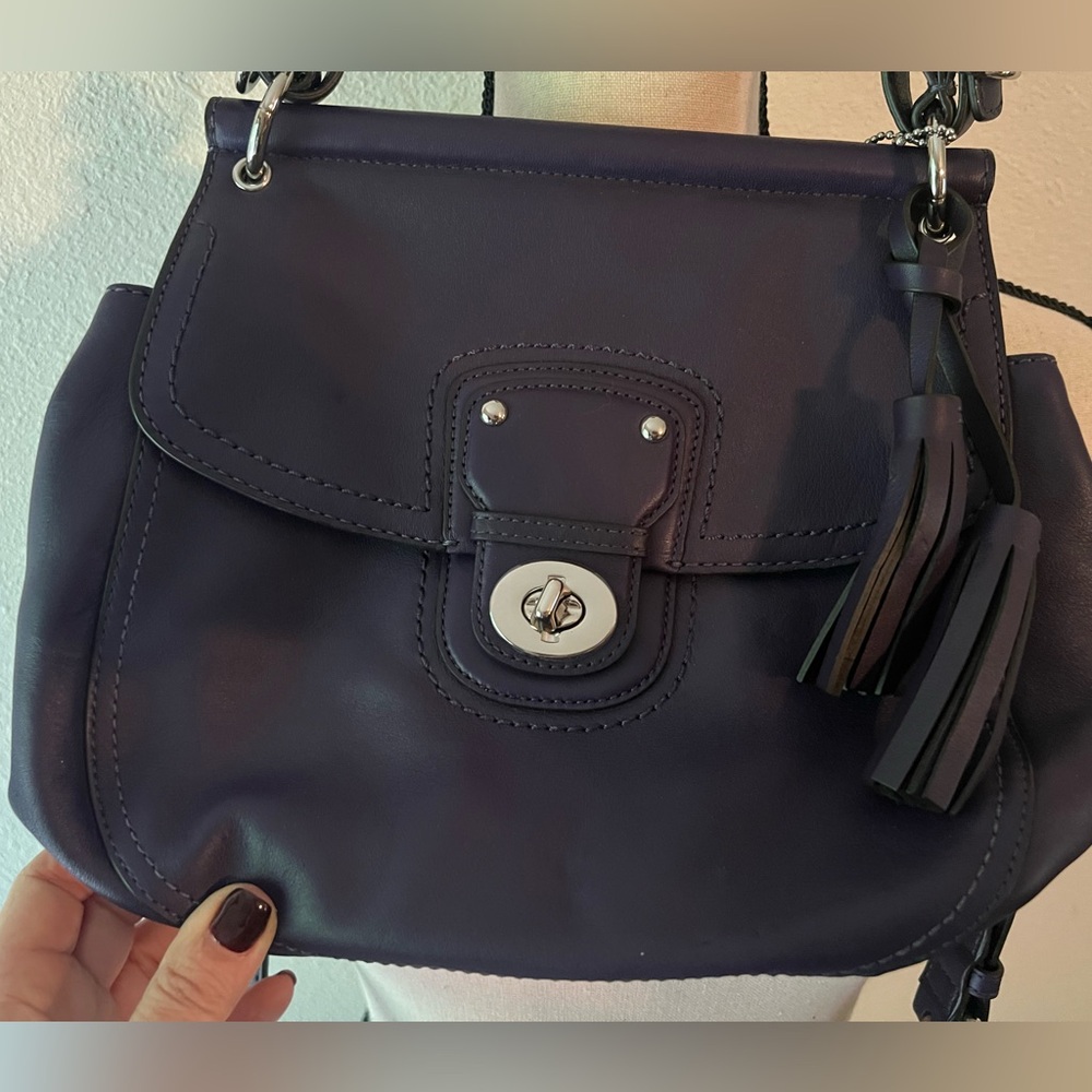 Coach purse in deep plum purple color